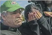  ?? ?? LAURA FRIAS, the mother of Xavier Chavarin, is comforted by her father, Jesus Frias, on Wednesday.