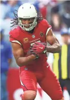  ?? MARK J. REBILAS / USA TODAY SPORTS ?? Arizona great Larry Fitzgerald ranks third all time with 1,234 receptions.