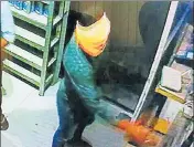  ?? HT PHOTO ?? A CCTV grab of the robbery at a petrol pump in SBS Nagar on Sunday.