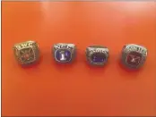  ??  ?? Championsh­ip rings (left to right) University of Arkansas, University of Northern Colorado, Mendocino College, Youngstown State University. Rings all earned by Kevin Smallcomb.