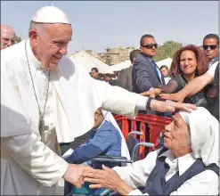  ??  ?? Pope Francis converses with a nun during a meeting Saturday with clergy and religious leaders in Cairo.