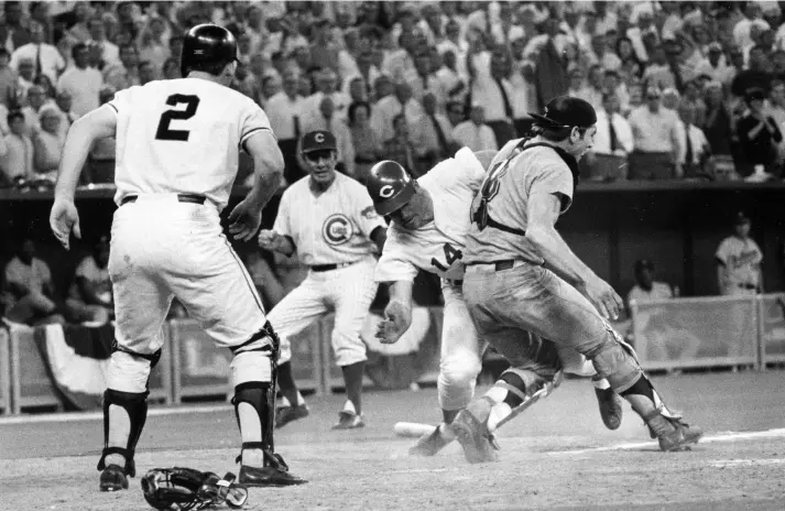  ?? AP FILE PHOTO ?? The National League’s Pete Rose slams into Ray Fosse to score the winning run in the 12th inning of the 1970 All-Star Game at Cincinnati’s Riverfront Stadium.