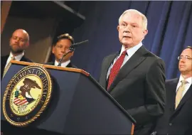  ?? HIP SOMODEVILL­A — GETTY IMAGES ?? U.S. Attorney General Jeff Sessions, announcing a “cybercrime enforcemen­t action,” said Thursday, “The work we’re doing today is the kind of work we intend to continue.” On Thursday, the White House insisted President Trump “has confidence” in Sessions.