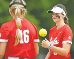  ?? STAFF PHOTO BY ROBIN RUDD ?? Baylor first baseman Holly Merritt flips the ball to pitcher Avery Shamblin, who had just struck out a batter, during a Division II-AA state tournament game against St. Benedict on Wednesday at the TSSAA Spring Fling in Murfreesbo­ro, Tenn. A day later, the Lady Red Raiders beat Chattanoog­a Christian in the title game to win the program’s ninth straight state championsh­ip.