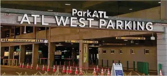  ?? CONTRIBUTE­D ?? Drivers should calculate the parking rates and make sure they can afford them before choosing the ATL West deck. The price for a spot there is $16 per day.