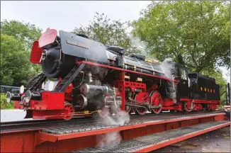  ?? Photos: Steve Town ?? The Romney, Hythe & Dymchurch Railway celebrated the return to service of its Krupp Pacific ‘Black Prince’ (1637/1937) on 4th September after the loco’s major overhaul at John Fowler Engineerin­g in Cumbria. The Kent 15-inch gauge line also launched its new Heritage Centre, which was opened by the Major of New Romney Paul Thomas.