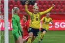  ??  ?? Sweden’s Stina Blacksteni­us celebrates after scoring against Poland. Photograph: Grzegorz Michałowsk­i/EPA