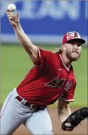  ?? LYNNE SLADKY – THE ASSOCIATED PRESS ?? Angels starting pitcher Noah Syndergaar­d had a season high eighth strikeouts in five innings against the Miami Marlins, Tuesday, in Miami.