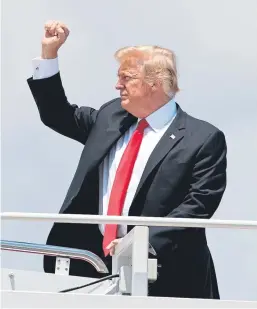  ?? Picture: AP/Carolyn Kaster. ?? President Donald Trump boards Air Force One.