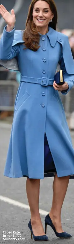  ??  ?? Caped Kate: In her £1,770 Mulberry coat