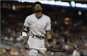  ?? ALEX BRANDON — THE ASSOCIATED PRESS FILE ?? The Miami Marlins’ Dee Gordon reacts after a strike during the ninth inning against the Washington Nationals at Nationals Park, Sept. 18, 2015in Washington.