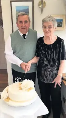  ??  ?? Golden couple anniversar­y Marion and Alick-John pictured marking their
