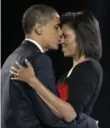  ?? THE CANADIAN PRESS FILE PHOTO ?? Barack and Michelle Obama’s publicly affectiona­te relationsh­ip was a sharp contrast to the Trumps.