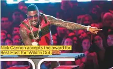  ??  ?? Nick Cannon accepts the award for Best Host for ‘Wild ‘n Out’.