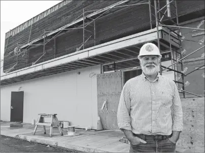  ?? CHRIS SHANNON/CAPE BRETON POST ?? Gerald Lalonde, architect and project manager for Membertou’s corporate division, says the Indigenous community’s latest project, the Lanes at Membertou bowling centre, will see constructi­on completed by the end of October. An official opening date is being planned for November. Lalonde said poor weather over the winter caused a few delays, forcing the contractor to push back the constructi­on timetable by several weeks.