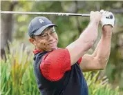  ?? Kevin Kolczynski/Associated Press ?? Tiger Woods is returning to competitio­n for the first time without the use of a cart since July, announcing Friday he will play at the Genesis Invitation­al in Los Angeles.