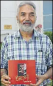  ?? SUSHIL PRAJAPATI/HT ?? Writer Harvinder Singh Bhatti with the book.