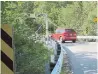  ??  ?? The weeds and trees on Sewells Rd. were trimmed in 2016, but the vegetation has since grown back more thickly.