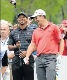  ?? Picture: GETTY IMAGES/SULEYMAN ELCIN ?? READY FOR ACTION: Tiger Woods of the US and England’s Justin Rose during the Turkish Airlines Open in 2013