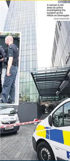  ?? SEAN HANSFORD ?? A woman is led away by police investigat­ing the incident at the Hilton on Deansgate