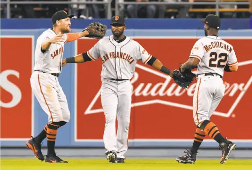  ?? Jayne Kamin-Oncea / Getty Images ?? The new outfield — Hunter Pence in left, Austin Jackson in center and 2013 NL MVP Andrew McCutchen in right — gives the Giants a lot of experience, but the three have six hits in 42 at-bats. Newcomers Jackson and McCutchen have just one apiece.
