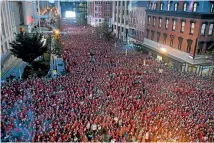  ?? AP ?? Capitals fans turned out en masse to watch game five of the Stanley Cup finals in Las Vegas from outside the Capital One Arena in Washington.