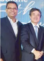  ??  ?? ISLA LPG Corp. (ILC) CEO Ruben Domingo and IPG CEO Shoichi Watanabe.