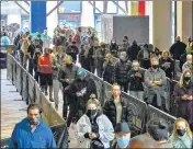  ?? BLOOMBERG ?? Voters wait to cast ballots in New York.