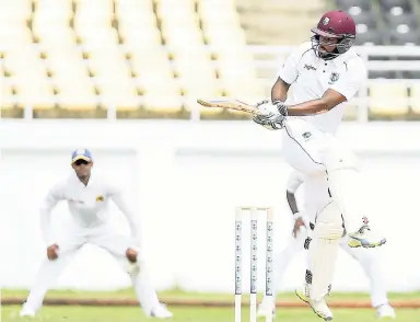  ?? CWI PHOTO ?? Windies ‘A’ opener John Campbell swings into the leg-side on yesterday’s first day of the first ‘Test’ against Sri Lanka ‘A’ at the Trelawny Multipurpo­se Multiplex.