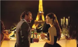  ?? CAROLE BETHUEL/NETFLIX ?? William Abadie as Antoine Lambert and Lily Collins as Emily in “Emily In Paris.”