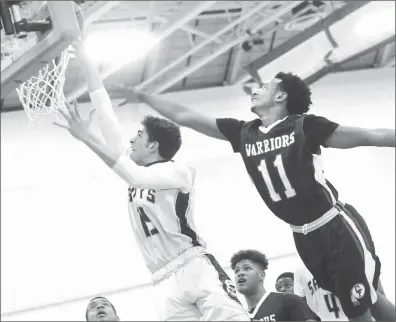  ?? Photo by Ernest A. Brown ?? The St. Raphael boys basketball team is back in the Donaldson-Lynch tournament title game after defeating Central Falls Thursday night. The reigning tournament champions will take on All-State point guard Erickson Bans and Shea tomorrow.