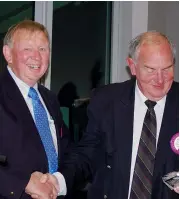  ??  ?? Warragul Lions Club president Brian Grist presents the Win Tyquin award to Lion Graeme Perkins.