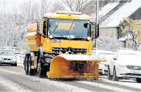  ??  ?? Chilly Snow plough in Albert Place, Stirling, on Friday morning