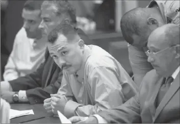  ?? Michael Robinson Chavez
Los Angeles Times ?? A PRELIMINAR­Y hearing is underway to determine whether Louie Sanchez, center, and Marvin Norwood, far left, should stand trial in the beating of Giants fan Bryan Stow on opening day last year at Dodger Stadium.