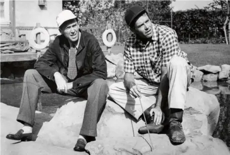  ?? PHOTOFEST/SIMON & SCHUSTER ?? Opposites attract: One Hollywood star was an outgoing, gregarious Republican married to the same woman for 45 years. The other a crusty, womanizing Democrat. And yet James Stewart, left, and Henry Fonda (in 1947) had a close friendship that spanned...