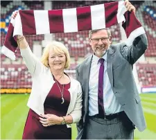  ??  ?? Craig Levein is unveiled as Hearts’ new manager alongside chairwoman Ann Budge.