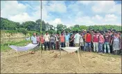  ?? PHOTO ?? Villagers and family members of the two victims, Rajesh Sarkar, 19, and Tapash Burman, 21, have refused to cremate the bodies.HT