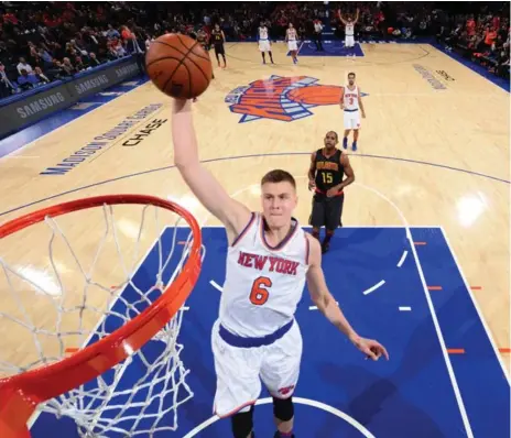 ?? JESSE D. GARRABRANT/NBAE/GETTY IMAGES ?? Kristaps Porzingis, the Knicks’ seven-foot-three rookie forward, boasts a combinatio­n of athleticis­m and a solid perimeter game that’s rare for a big man.