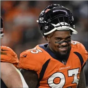  ?? RJ SANGOSTI — THE DENVER POST ?? Broncos defensive end Dre’mont Jones smiles toward the sidelines at Empower Field at Mile High during a game against the Colts on Oct. 6 in Denver.
