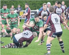  ?? ?? The impressive Jake Lyon makes a tackle for Scarboroug­h.