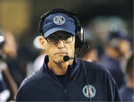  ?? COLE BURSTON/THE CANADIAN PRESS ?? Toronto head coach Marc Trestman has been fired after the Argos were a bust on the field and at the box office.