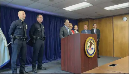  ?? PHOTO BY NATHANIEL PERCY ?? U.S Attorney Martin Estrada announces charges against Jaime Tran at the U.S. Attorney’s Office in downtown Los Angeles.