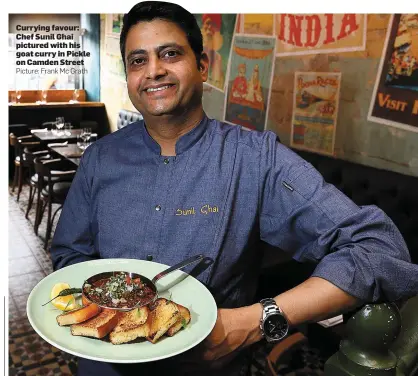  ??  ?? Currying favour: Chef Sunil Ghai pictured with his goat curry in Pickle on Camden Street Picture: Frank Mc Grath