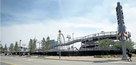  ?? JULIE JOCSAK/POSTMEDIA NEWS ?? The go-carts ‘on steroids’ attraction being built on Clifton Hill joins a number of other new attraction­s.