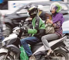 ?? REUTERS PIC ?? Bankers have listed Go-Jek’s likely initial public offering as a key float to track in Asia’s ride-hailing and mobile payments market.
