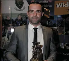  ??  ?? Daragh O’Sullivan with his St Patrick’s GAA Senior Player of the Season Award 2013.