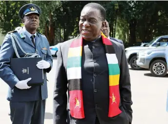  ?? — Pictures: Innocent Makawa ?? President Mnangagwa jokes with journalist­s on his way to the first 2024 Cabinet meeting at State House in Harare yesterday.