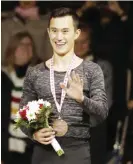  ??  ?? ONTARIO: Canada’s Patrick Chan waves from the podium after he won the Skate Canada figure skating event in Mississaug­a, Ontario, on Saturday. — AP