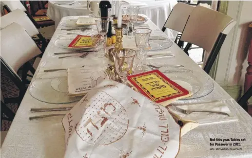  ?? NEIL STEINBERG/SUN-TIMES ?? Not this year. Tables set for Passover in 2015.