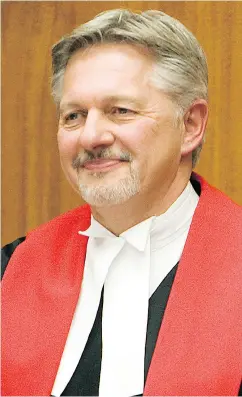  ?? GREG PENDER / POSTMEDIA NEWS ?? Richard Chartier, chief justice of Manitoba, left, and Martel Popescul, chief justice of the Saskatchew­an Court of Queen’s Bench, right, were selected to serve on the committee probing the conduct of Ontario Superior Court Justice Frank Newbould. The...
